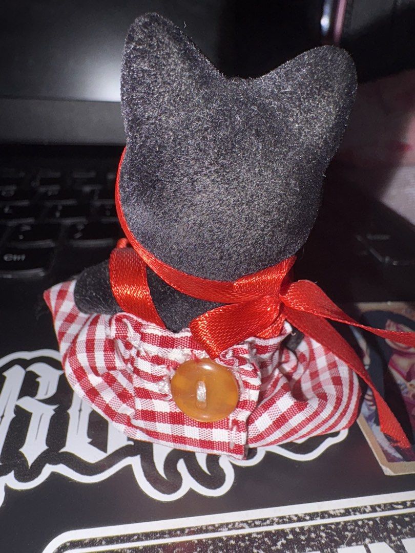 Sylvanian Black Cat Sister (Category: Interactive Toys) located in Mandaluyong City. Submitted by strawb101 (Listing ID 1468231069, Image 2). Description: She has some dust due to being displayed x sensi but she’s okay. Her dress is sewn and diy by me. As is. Gcash/jnt/lalamove .