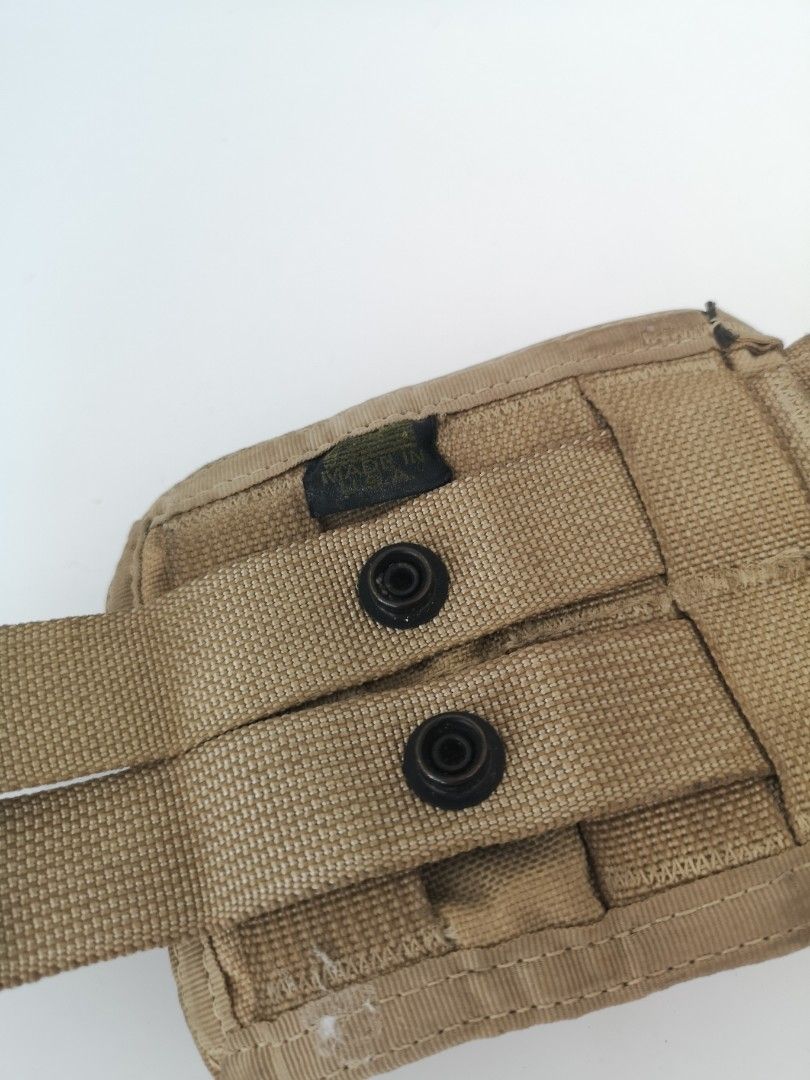 Tactical Tailor Mag Pouch & MOLLE Canteen pouch (Category: Combat Sports) located in Manila. Submitted by isko_sarisari (Listing ID 1468119232, Image 3). Description: Tactical Tailer dual mag pouch in Tan With U.S. Army MOLLE II 1-Quart Canteen and General Purpose (GP) Pouch in M81 Woodland Camouflage. [1, 2] Key Details Design/Purpose: Built to hold a standard 1-quart military canteen, though frequently repurposed as a general utility or gear po