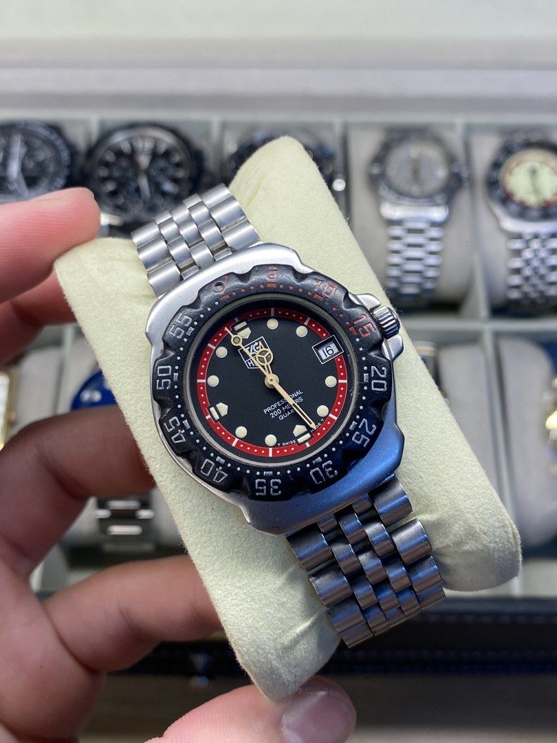TAG Heuer “red accent” Formula 1 classic (Category: Luxury Watches) located in Manila. Submitted by mharkkk (Listing ID 1468252863, Image 1). Description: TAG Heuer Formula 1 classic Ref. WA1214 Movement: swiss quartz Case size: 37mm Features date on 3 o’clock ₱20,000 📍Bulacan/QC Note: This is a pre-owned watch and may show signs of wear such as scratches, marks, or fading. Please manage your expectations..