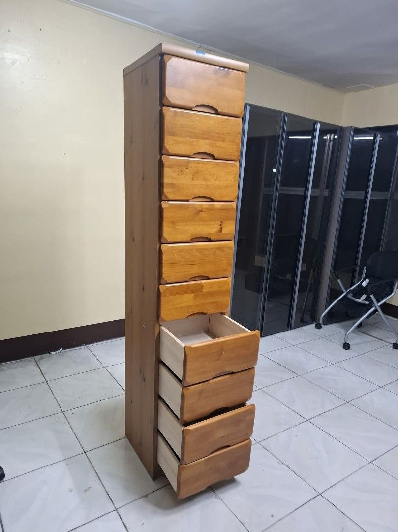 Tall Slim Drawer (Category: Shelves, Cabinets & Racks) located in Quezon City. Submitted by dannikkishoppe2 (Listing ID 1468276012, Image 2). Description: Tall Slim Drawer ‼️₱7800‼️ *solid wood drawers, plywood back *in good condition Please manage your expectations as there might be minimal flaws. Color may vary due to lighting, it may appear darker or lighter in person. Check photos first before buying. Please refrain from purchasing if you are