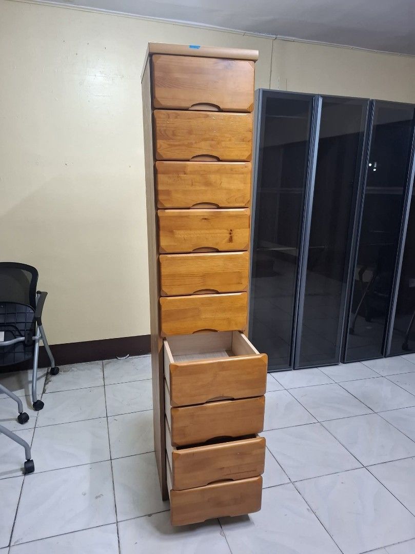 Tall Slim Drawer (Category: Shelves, Cabinets & Racks) located in Quezon City. Submitted by dannikkishoppe2 (Listing ID 1468276012, Image 3). Description: Tall Slim Drawer ‼️₱7800‼️ *solid wood drawers, plywood back *in good condition Please manage your expectations as there might be minimal flaws. Color may vary due to lighting, it may appear darker or lighter in person. Check photos first before buying. Please refrain from purchasing if you are