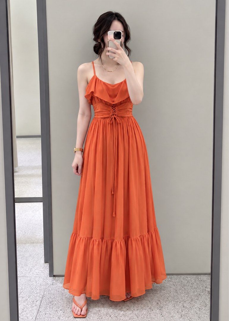 Tangerine Maxi Flowy Dress (Category: Dresses) located in Cagayan de Oro. Submitted by missguidedmom (Listing ID 1468228550, Image 2). Description: Fits small to semi large Smocked waist Bought in thailand.