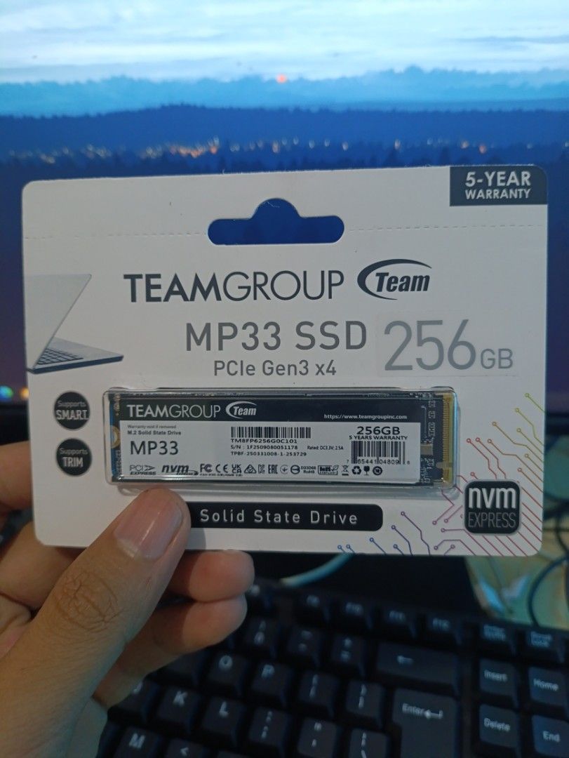 TEAMGROUP MP33 256GB M.2 SSD (Category: Hard Disks & Thumbdrives) located in Manila. Submitted by luwii0 (Listing ID 1468231317, Image 1). Description: - Brand: TEAMGROUP MP33 SSD - Capacity: 256GB storage - Interface: PCIe Gen3 x4 NVMe 1.3 - Speed: Up to 1,800 MB/s read, 1,500 MB/s write - Compatibility: Fits most laptops and desktops - Warranty: 5-year manufacturer warranty - Condition: Brand new in sealed retail packaging.