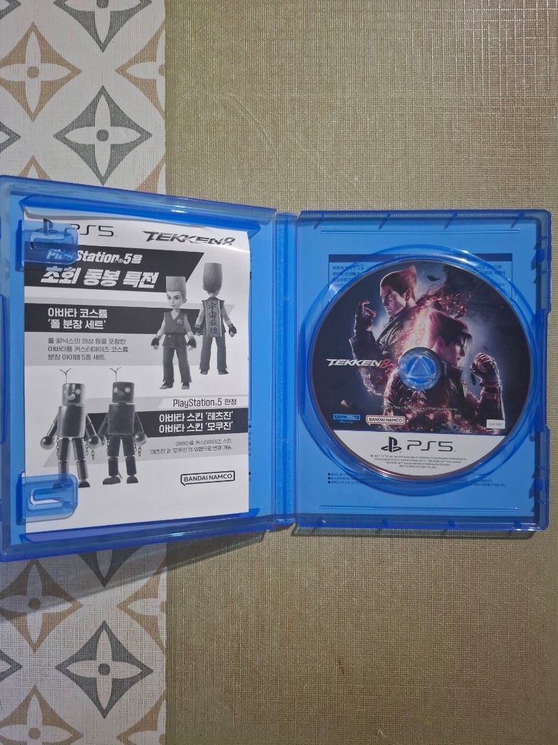 Tekken 8 PS5 Game Disc with Insert (Category: PlayStation) located in Manila. Submitted by mycool_09 (Listing ID 1468130802, Image 3). Description: - Platform: PlayStation 5 (PS5) - Condition: Disc is clean and 100% ready to play - Inclusion: Original blue case, game disc, and bonus insert leaflet - Region/Version: Korean release version with age rating on the cover - Genre: Action / Fighting - Voice Language: English - Screen Language: Korean.