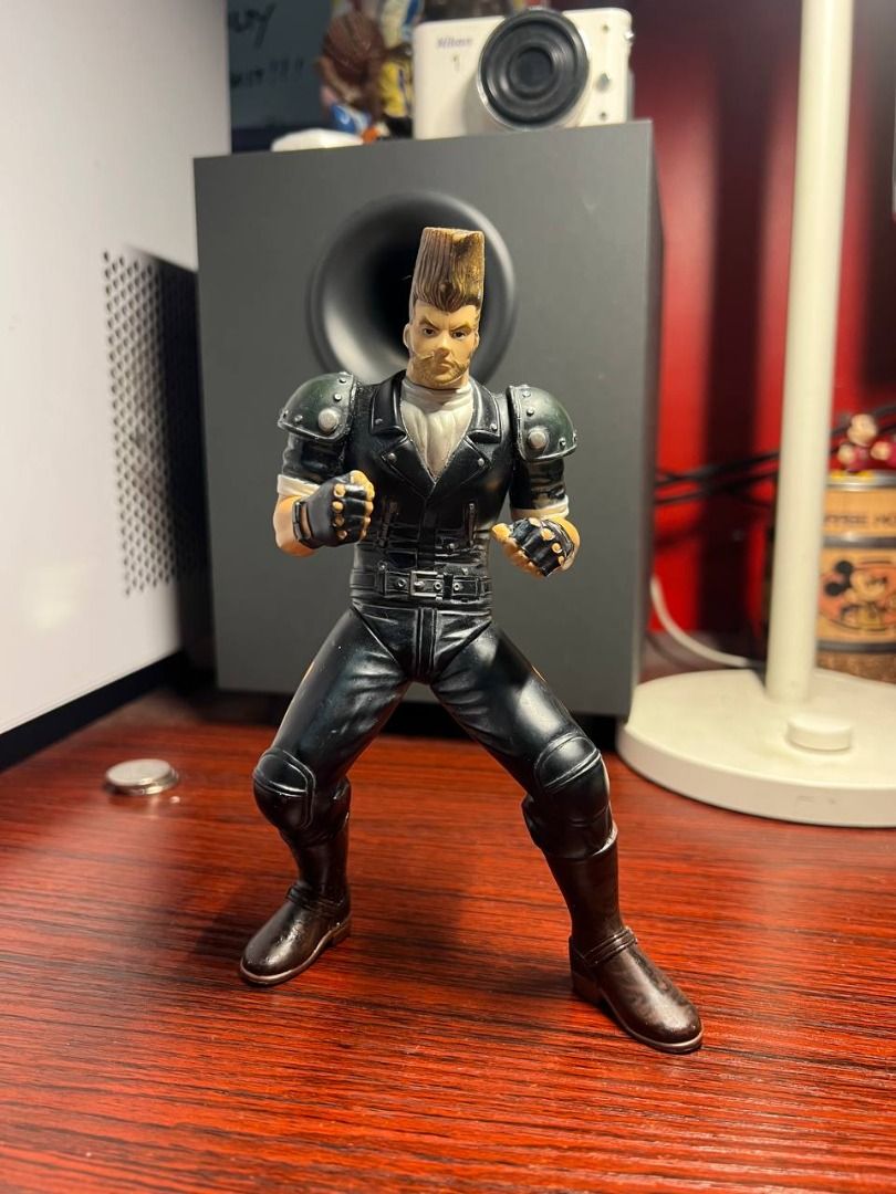 Tekken Paul Phoenix (Category: Figurines & Statues) located in Baguio. Submitted by ditoyzb08176 (Listing ID 1468206622, Image 1). Description: - Character: Paul Phoenix - Brand: Bandai & Epoch (marked on leg) - Condition: Loose figure only, no box, with minor scuffs and paint wear from age - Design: Iconic tall flattop hair and leather biker outfit with skull graphic - Ideal for: Collectors and fans of the fighting game series Location: Baguio C