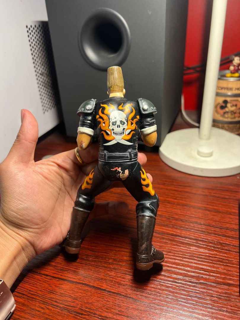 Tekken Paul Phoenix (Category: Figurines & Statues) located in Baguio. Submitted by ditoyzb08176 (Listing ID 1468206622, Image 3). Description: - Character: Paul Phoenix - Brand: Bandai & Epoch (marked on leg) - Condition: Loose figure only, no box, with minor scuffs and paint wear from age - Design: Iconic tall flattop hair and leather biker outfit with skull graphic - Ideal for: Collectors and fans of the fighting game series Location: Baguio C