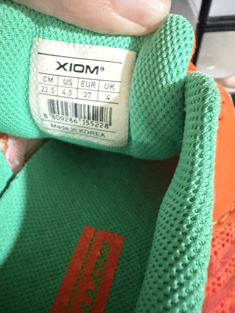 tennis shoes 600 for both (Category: Sneakers) located in Makati City. Submitted by sausage011 (Listing ID 1468106182, Image 2). Description: - Bundle Deal: Selling 2 pairs of sneakers together - Pair 1: Bright orange XIOM sneakers, Size EUR 37, Made in Korea - Pair 2: White with blue stripes, Size EUR 39, Made in China - Condition: Pre-loved with normal signs of use on soles and uppers - Perfect for sports, workouts, or casual everyday wear - Gr