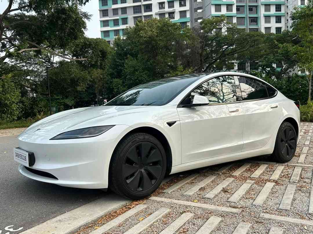 Tesla Model 3 Electric Standard Range (A) (Category: Used Cars) located in Singapore. Submitted by carbuyersclub (Listing ID 1451583347, Image 2). Description: CarBuyers Club SG #1 Tesla reseller, 500+ Google reviews, SGCM Premium Dealer 2026! Immaculate condition, mint condition taken really good care by the previous owner. Car came with a nice wrap for additional car protection. Minimalistic interior to prevent complication. Comes with 4 years 