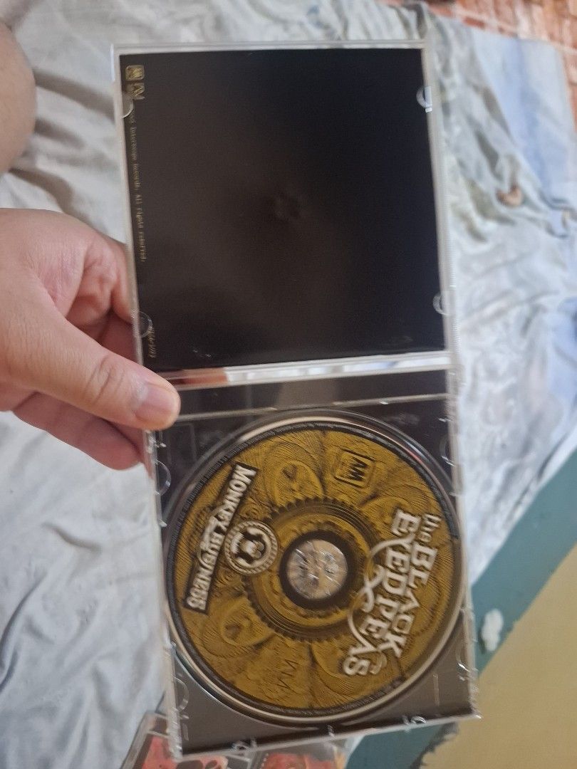 The Black Eyed Peas Monkey Business CD (Category: CDs & DVDs) located in San Jose del Monte. Submitted by youweiner48495 (Listing ID 1468140847, Image 3). Description: - Original The Black Eyed Peas Monkey Business Japan audio CD - Includes jewel case, original artwork booklet, and back tracklist insert no obi - Clean disc surface with no major scratches, plays without skipping - Features iconic 2000s hits like 'Pump It' and 'My Humps' - Perfect 