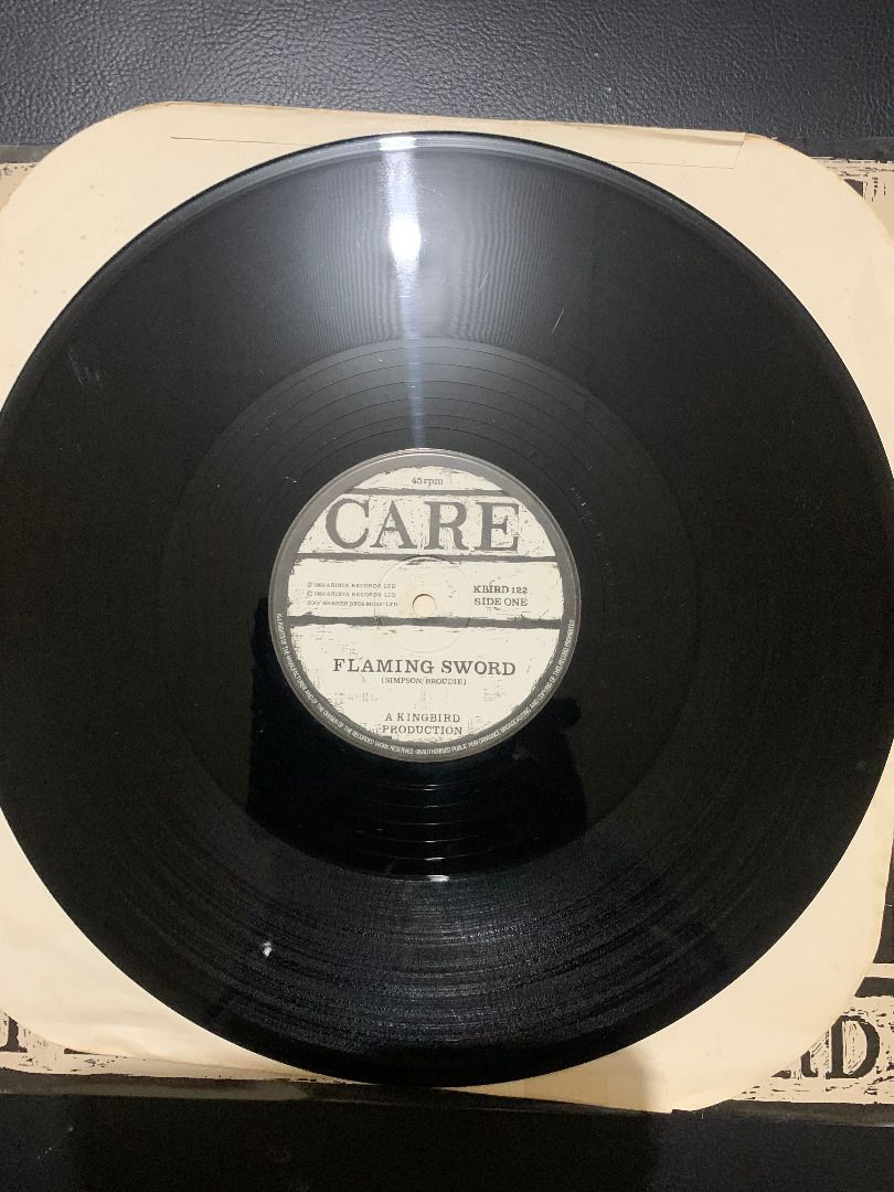 The Care - Flaming Sword (Category: Vinyls) located in Paranaque City. Submitted by bulldogdad (Listing ID 1468280876, Image 3). Description: - The Care - Flaming Sword - 1983 Rare New Wave Classic - 12-inch 45 RPM Arista label (Made in the UK).