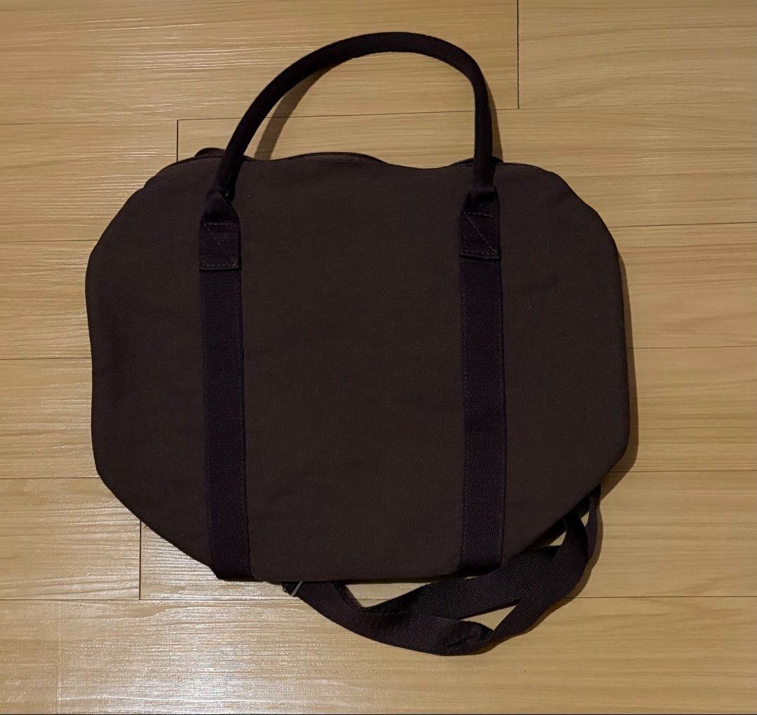 The Coffee Bean & Tea Leaf Affogato Duffel Bag (Category: Travel Essentials & Accessories) located in Quezon City. Submitted by garagesale2026 (Listing ID 1468079895, Image 3). Description: - Brand new - 2024 Holiday Collection - Side pockets; Interior zippered pocket; Adjustable shoulder strap.