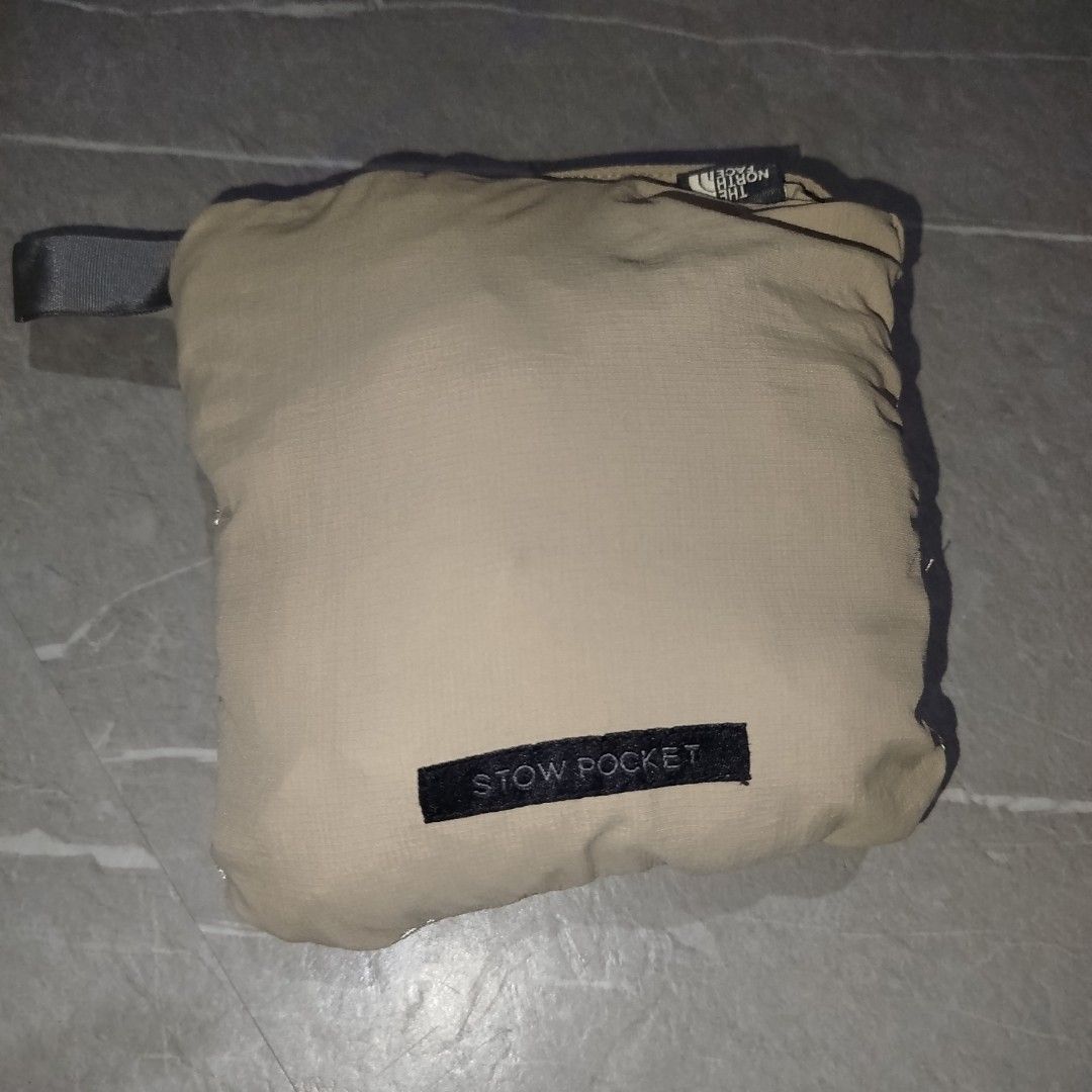 The North Face Beige Cargo Shorts (Category: Shorts) located in Davao. Submitted by vernoneighty4 (Listing ID 1467476896, Image 2). Description: - Brand: The North Face - Color: Classic Beige - Material: Durable, quick-dry nylon - Features: Multiple button-flap cargo pockets for storage - Comfort: Elastic waistband panels on the sides - Details: Embroidered logo on the lower left leg, standard button closure, and zip fly - Ideal for: Hiking, outd