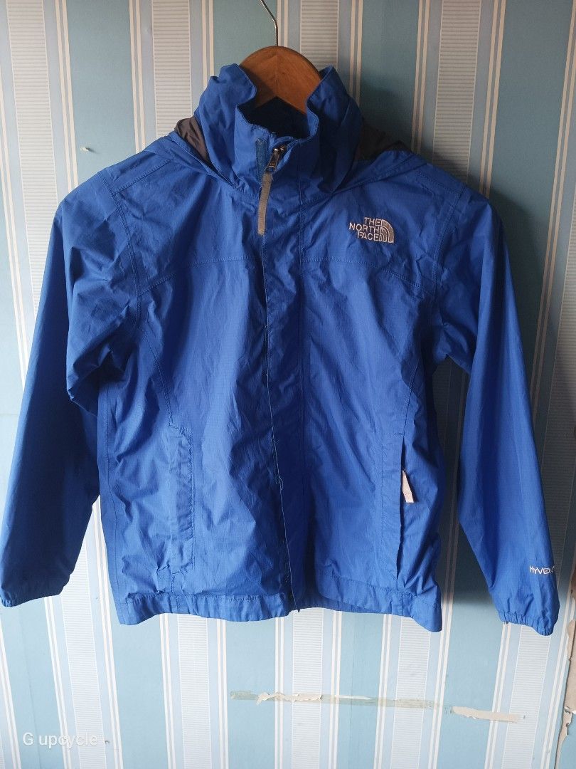 THE NORTH FACE young explorer jacket (Category: Hiking & Camping) located in Cebu City. Submitted by glennbryceland031185 (Listing ID 1468081213, Image 1). Description: Blue lightweight waterproof rain jacket from The North Face, HyVent fabric technology. Packable hood. for 8 to 11 years old..