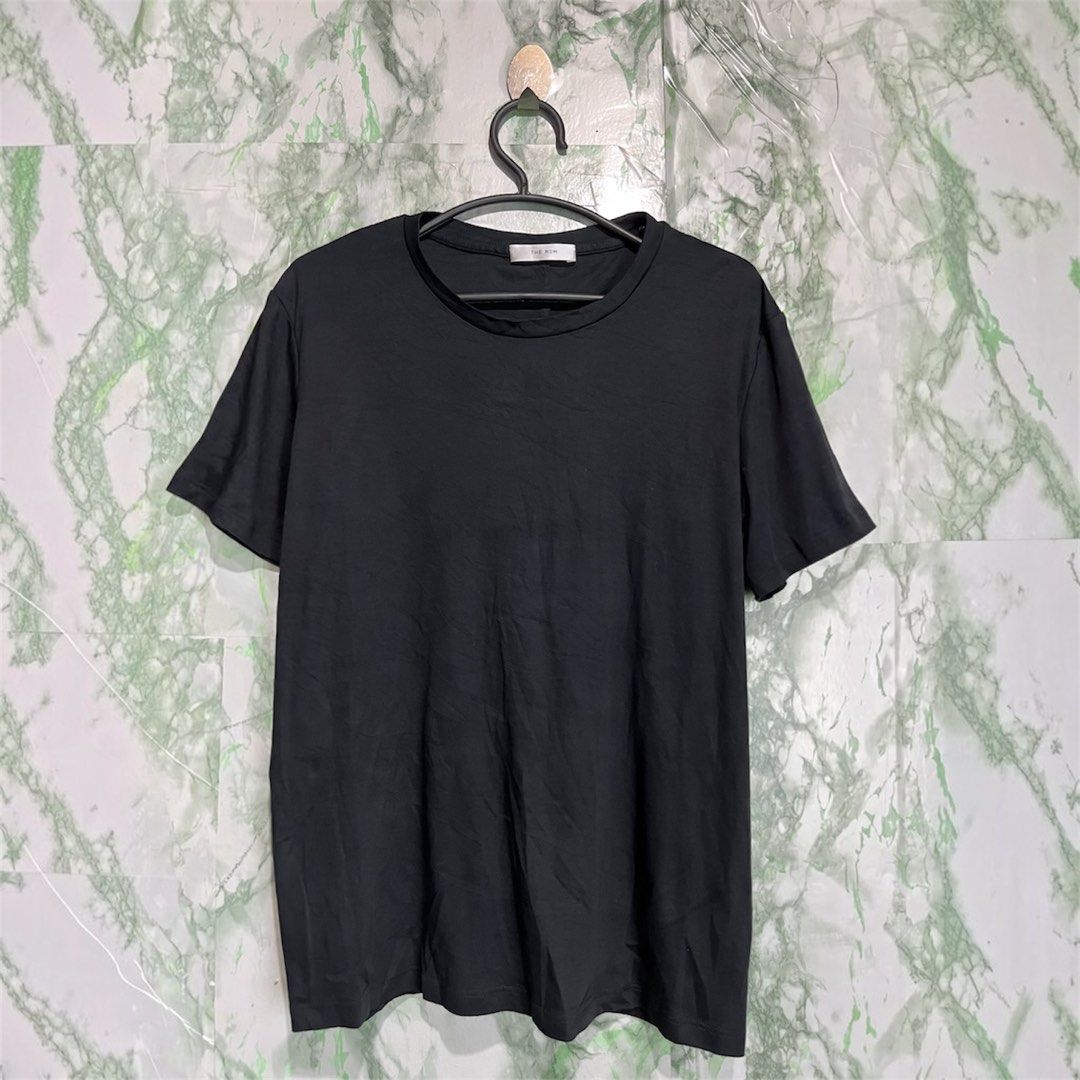 THE ROW T-shirt (Category: Shirts) located in Bulacan. Submitted by letsfindukaywithme (Listing ID 1468064490, Image 1). Description: The Row T-shirt XL 19x24" Cotton strechable like new No issue +sf payment first Ship via J&T.