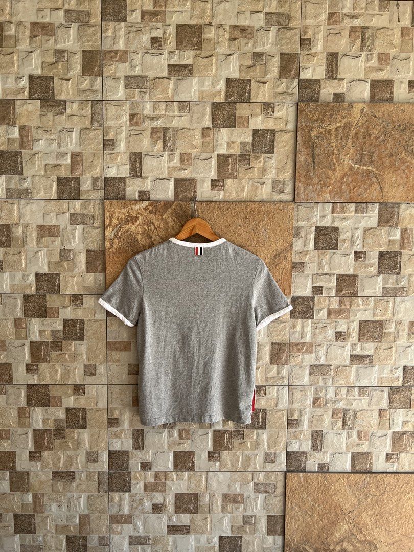 THOM BROWNE - 2 TONE T SHIRT (Category: Luxury Accessories) located in Bacolod City. Submitted by timelessbyjosh (Listing ID 1468171807, Image 2). Description: BEST FOR CASUAL & COZY OUTFITS SIZE : ACTUAL COLOR : COLOR RATE : CONDITION : MATERIAL : MADE IN : FLAWS : NONE DIMENSIONS LENGTH - WIDTH - MEASUREMENT TAKEN WHILE LAYING FLAT. PLEASE COMPARE THE MEASUREMENT WITH YOUR GARMENT. .