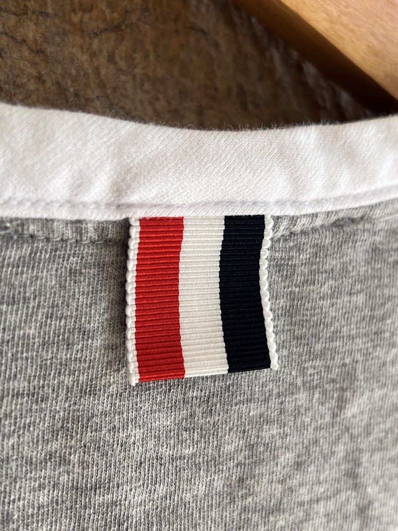 THOM BROWNE - 2 TONE T SHIRT (Category: Luxury Accessories) located in Bacolod City. Submitted by timelessbyjosh (Listing ID 1468171807, Image 3). Description: BEST FOR CASUAL & COZY OUTFITS SIZE : ACTUAL COLOR : COLOR RATE : CONDITION : MATERIAL : MADE IN : FLAWS : NONE DIMENSIONS LENGTH - WIDTH - MEASUREMENT TAKEN WHILE LAYING FLAT. PLEASE COMPARE THE MEASUREMENT WITH YOUR GARMENT. .