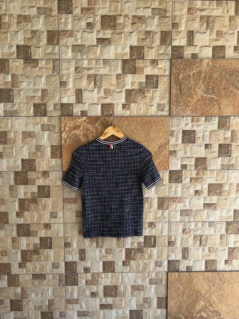 THOM BROWNE - TWEED BLEND TSHIRT (Category: Luxury Apparel) located in Bacolod City. Submitted by timelessbyjosh (Listing ID 1468171487, Image 2). Description: BEST FOR CASUAL & COZY OUTFITS SIZE : 38 ACTUAL COLOR : SHADE OF BLUE , WHITE & RED COLOR RATE : 10 OUT OF 10 CONDITION : NEAR NEW MATERIAL : 99 % COTTON & 1 % POLYURETHANE MADE IN : ITALY FLAWS : NONE DIMENSIONS LENGTH - 21. 5 WIDTH - 14 — SLIGHTY STRETCHABLE FABRIC MEASUREMENT TAKEN WHIL
