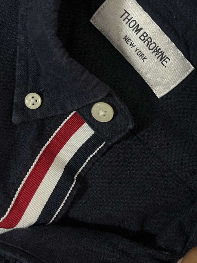 THOM BROWNE BUTTON UP POLO SHIRT AUTHENTIC (Category: Tshirts & Polo Shirts ) located in Mabalacat. Submitted by bizzybones (Listing ID 1468083364, Image 3). Description: “26-27Length “20Width Authentic/Legit No issue Excellent condition Mop gcash courier jnt.