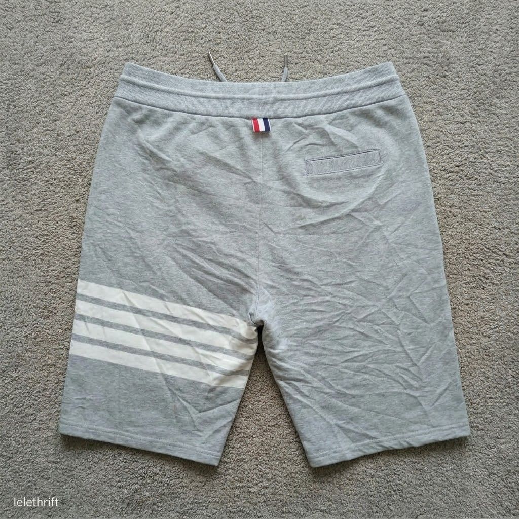 Thom Browne sweat short (Category: Shorts) located in Batangas. Submitted by lelethrift.com (Listing ID 1468178086, Image 2). Description: Thom Browne Sweat short size: 30-32 Complete tags Excellent condition no issue ready to wear na.