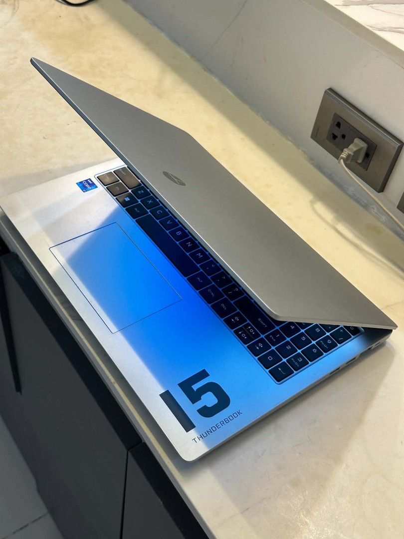 THUNDER ROBOT T-Book 15D (Category: Laptops & Notebooks) located in Pasig City. Submitted by erhecca.bear (Listing ID 1468103433, Image 2). Description: THUNDER ROBOT T-Book 15D Quick Specs: -Intel core i7, 13th Gen -16GB RAM DDR4 -512GB SSD NVMe -Intel UHD Graphics -60Hz Refresh rate -1920 x 1080 Display mode -15inches diagonally -GOOD FOR VA, ACAD & OFFICE PURPOSES etc. -9.5/10 Condition, NO BUMP Inclusion: -Unit & Charger w/ normal Sling bag.