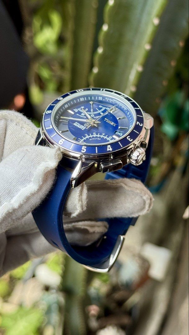 Timex Intelligent Quartz Fly-Back Chronograph Blue Silicone Watch (Category: Men's Watches) located in Manila. Submitted by junjun12356 (Listing ID 1468282173, Image 3). Description: - Brand: Timex Intelligent Quartz Fly-Back Chronograph - Dial & Bezel: Deep blue sunburst dial with matching blue bezel - Strap: Comfortable blue silicone strap - Features: Multiple sub-dials for 24-hour and minute tracking, date window at 4 o'clock - Hardware: Polis