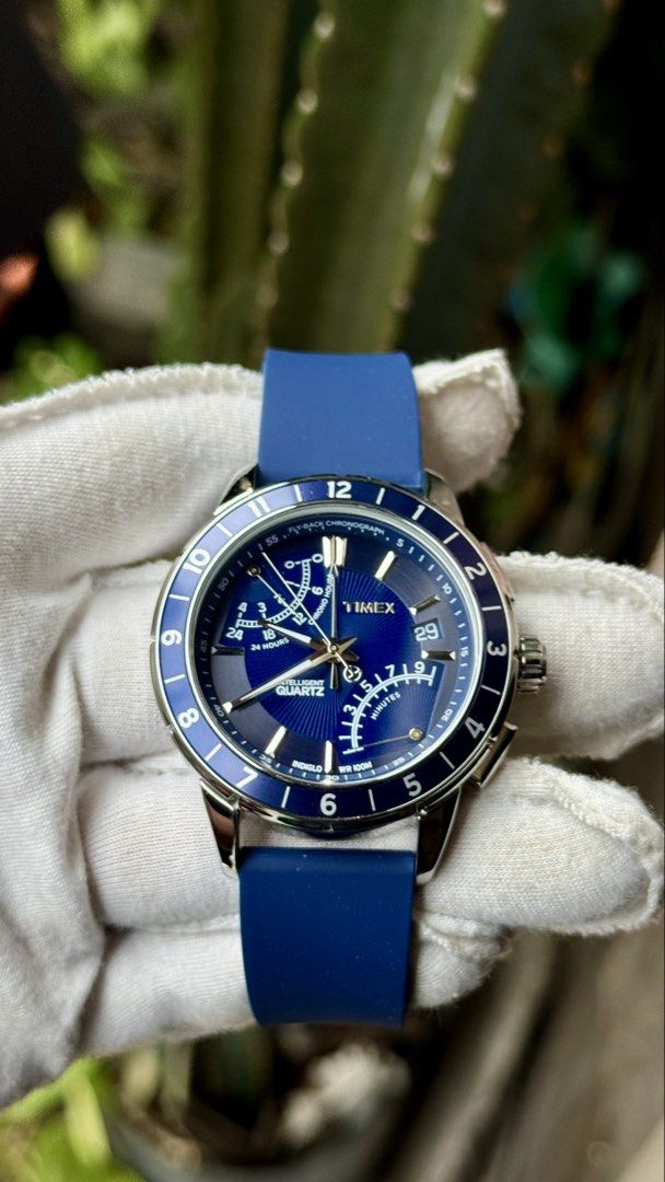 Timex Intelligent Quartz Fly-Back Chronograph Blue Silicone Watch (Category: Men's Watches) located in Manila. Submitted by junjun12356 (Listing ID 1468282173, Image 1). Description: - Brand: Timex Intelligent Quartz Fly-Back Chronograph - Dial & Bezel: Deep blue sunburst dial with matching blue bezel - Strap: Comfortable blue silicone strap - Features: Multiple sub-dials for 24-hour and minute tracking, date window at 4 o'clock - Hardware: Polis
