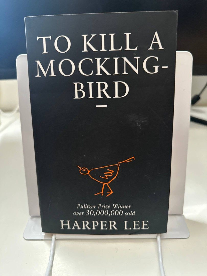 To Kill a Mockingbird by Harper Lee Arrow Books (Category: Storybooks) located in Imus. Submitted by t0t3fairi3 (Listing ID 1468065993, Image 1). Description: To Kill a Mockingbird by Harper Lee. Iconic Arrow Books paperback edition featuring the classic black cover with an orange bird illustration. A Pulitzer Prize-winning masterpiece with over 30 million copies sold. Standard reading copy with clean pages, perfect for your bookshelf..