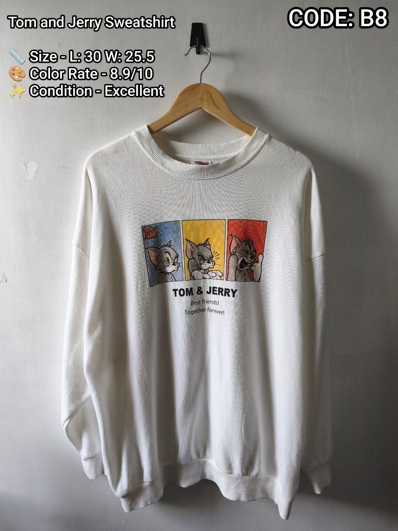 Tom and Jerry Sweatshirt White Code B8 (Category: Coats, Jackets and Outerwear) located in Manila. Submitted by gelog2 (Listing ID 1468144678, Image 1). Description: - Item: White Tom & Jerry sweatshirt - Design: Chest graphic with 3 comic panels and 'Tom & Jerry Best friends! Together forever!' text - Details: Ribbed collar, cuffs, and hem - Condition: Excellent overall, 8.9/10 color rate - Size/Measurements: Length 30", Width 25.5".