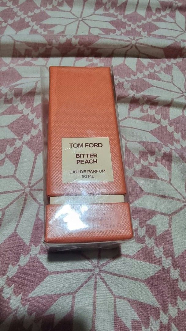 Tom Ford Bitter Peach Eau De Parfum 50ml (Category: Fragrance & Deodorants) located in Urdaneta. Submitted by moxieberrycule (Listing ID 1468135800, Image 1). Description: Tom Ford Bitter Peach EDP perfume 50ml Original and authentic Few sprays missing Not perfect plastic but in good condition bottle Bought for 22,100 Selling for 21,000 (excluding shipping fee) Last 1pc PM for sure, responsible buyer Payment first No return, no refund..