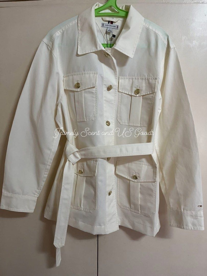 TOMMY HILFIGER BELTED UTILITY JACKET MEDIUM (Category: Coats, Jackets and Outerwear) located in Las Pinas. Submitted by jaimelyscent_ (Listing ID 1468124261, Image 2). Description: TOMMY HILFIGER BELTED UTILITY JACKET MEDIUM IVORY WHITE ✅NEW ARRIVAL FROM USA🇺🇸✅$179 MALL PRICE NOW ON CLEARANCE 📌2999.00 ONLY GRAB IT NOW.