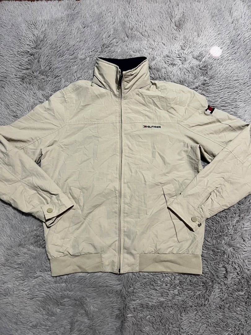 Tommy Hilfiger packable hood jacket (Category: Coats, Jackets and Outerwear) located in Manila. Submitted by loreenajoc (Listing ID 1468218282, Image 3). Description: Tommy Hilfiger packable hood jacket Excellent condition Small but fit meduim to semi large No issue Need wash sa left sleeve.