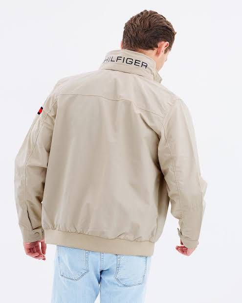 Tommy Hilfiger packable hood jacket (Category: Coats, Jackets and Outerwear) located in Manila. Submitted by loreenajoc (Listing ID 1468218282, Image 2). Description: Tommy Hilfiger packable hood jacket Excellent condition Small but fit meduim to semi large No issue Need wash sa left sleeve.