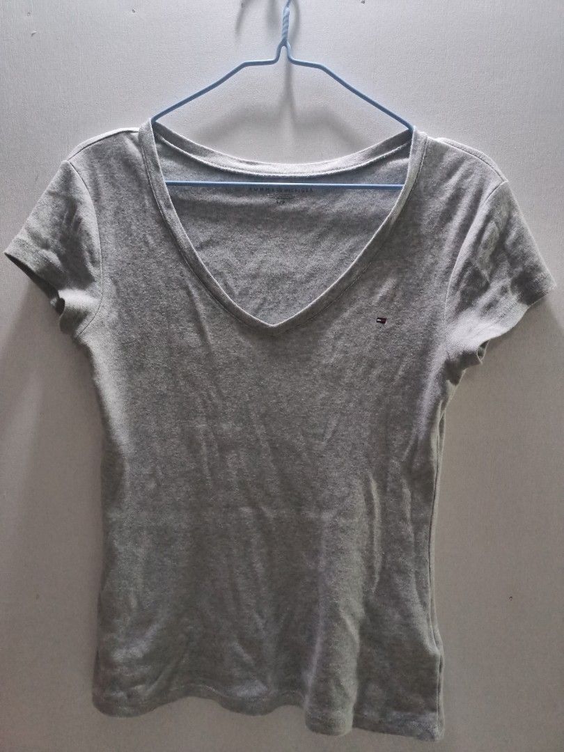 Tommy Y2k Shirt (Category: Shirts) located in Bislig. Submitted by vanityarchives (Listing ID 1468069689, Image 1). Description: tommy y2k top can be paired with lace cami and flared jeans, super nice outcome for this pair.