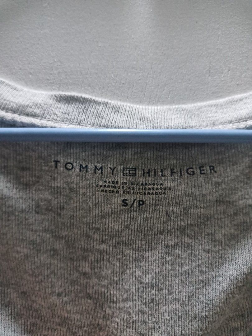 Tommy Y2k Shirt (Category: Shirts) located in Bislig. Submitted by vanityarchives (Listing ID 1468069689, Image 2). Description: tommy y2k top can be paired with lace cami and flared jeans, super nice outcome for this pair.
