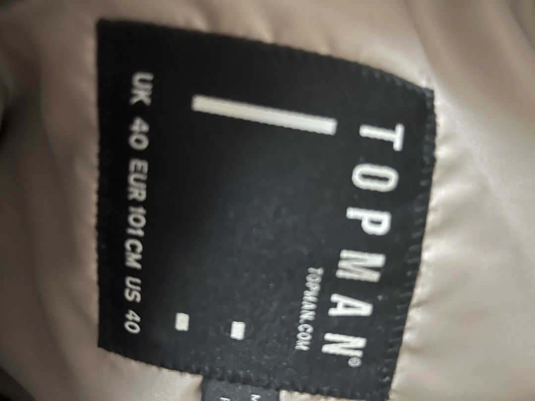 Topman Suede Bomber Jacket Grey UK 40 (Category: Coats, Jackets and Outerwear) located in Cainta. Submitted by dryan0723 (Listing ID 1468077098, Image 2). Description: - Brand: Topman - Style: Bomber jacket - Color: Grey - Material: Faux suede - Size: UK 40 / EUR 101cm / US 40 - Features: Zip front closure, ribbed collar, cuffs, and hem - Pockets: Two front pockets with snap buttons and one zip pocket on the left sleeve.