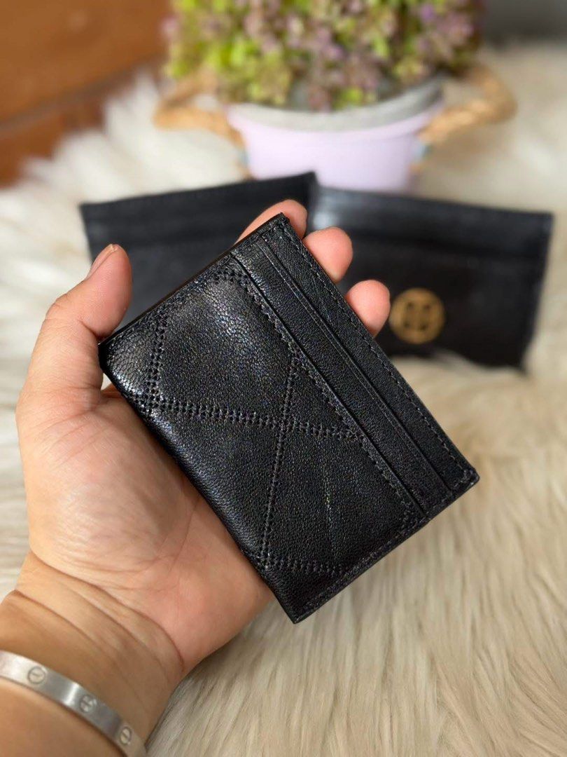 Tory Burch Black Leather Card Holder Wallet (Category: Luxury Bags & Wallets) located in Manila. Submitted by clairetot (Listing ID 1468132088, Image 3). Description: Authentic Tory Burch black leather card holder featuring gold-toned hardware, multiple card slots, and a chic pebble leather finish. Compact and perfect for small bags. PM for details or fast shipping!.