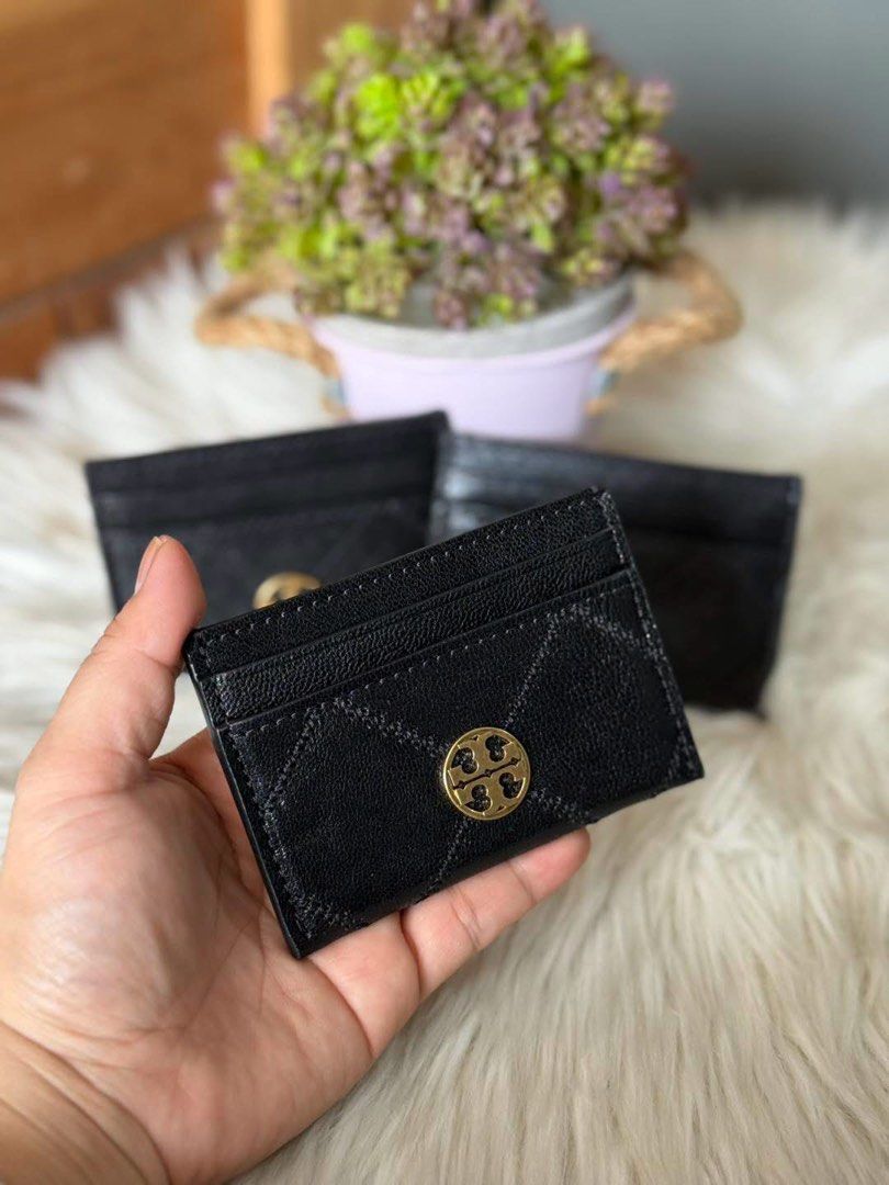 Tory Burch Black Leather Card Holder Wallet (Category: Luxury Bags & Wallets) located in Manila. Submitted by clairetot (Listing ID 1468132088, Image 2). Description: Authentic Tory Burch black leather card holder featuring gold-toned hardware, multiple card slots, and a chic pebble leather finish. Compact and perfect for small bags. PM for details or fast shipping!.