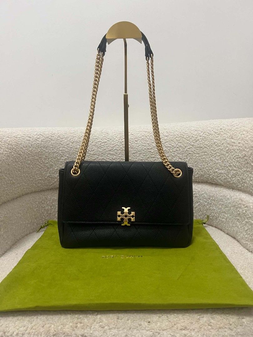 Tory Burch Charlie Convertible Shoulder Bag (Category: Shoulder Bags) located in Paoay. Submitted by rvf1230 (Listing ID 1468072552, Image 2). Description: - Authentic Tory Burch shoulder bag - Black quilted leather with gold-tone chain straps and hardware - Flap top closure featuring the iconic double T logo clasp - Impeccable condition: clean interior and exterior, zero scuffs or scratches - Comes with the original bright green Tory Burch dust 
