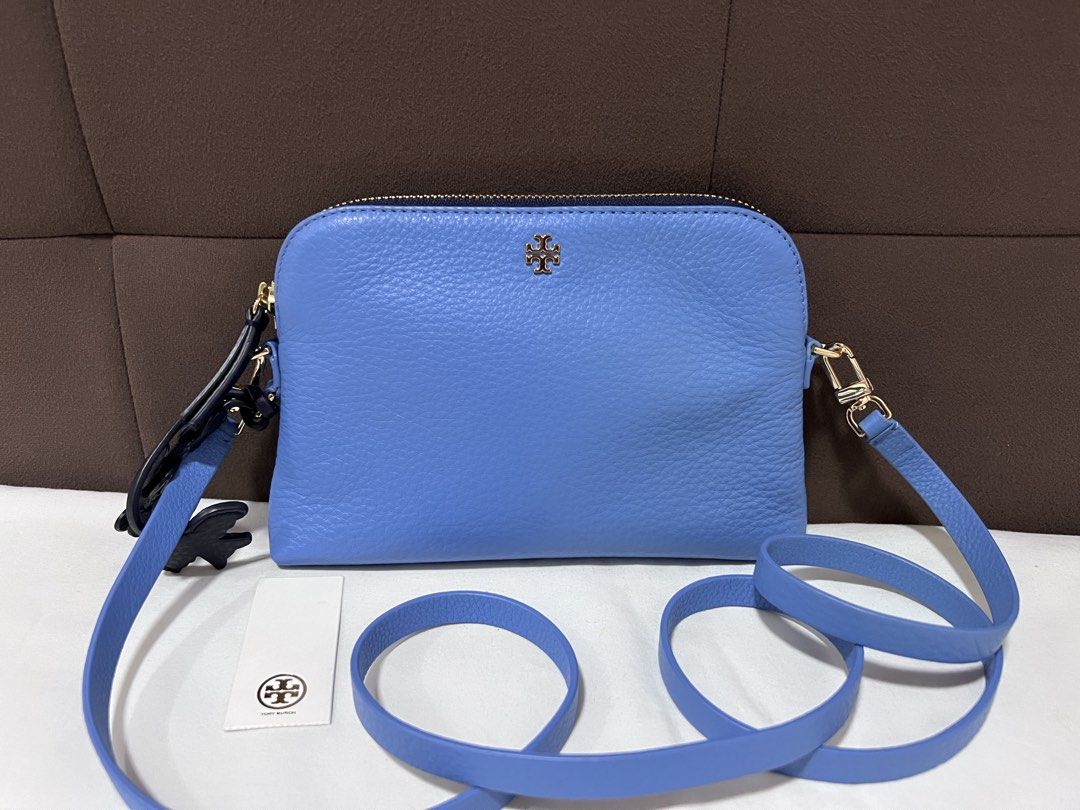 Tory Burch Pebbled bag (Category: Luxury Bags & Wallets) located in Cabanatuan. Submitted by hellorhea (Listing ID 1468216945, Image 1). Description: Pebbled leather texture With heart and bird like pendant on the side With tag seen in the picture .