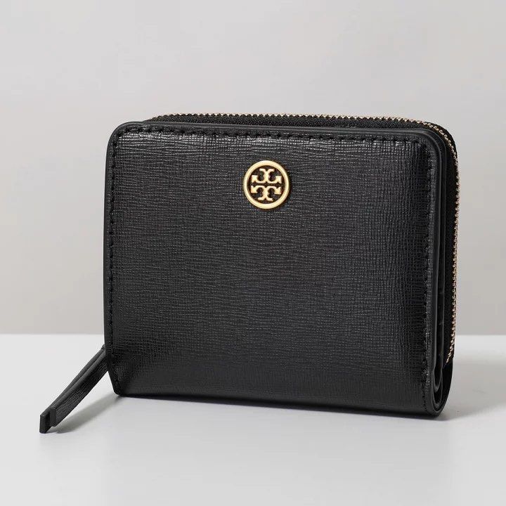 Tory burch robinson (Category: Wallets & Card holders) located in Baguio. Submitted by rheaanne07 (Listing ID 1468279153, Image 1). Description: Orig With flaw sa isang cardslot May punit Still pretty and matibay.