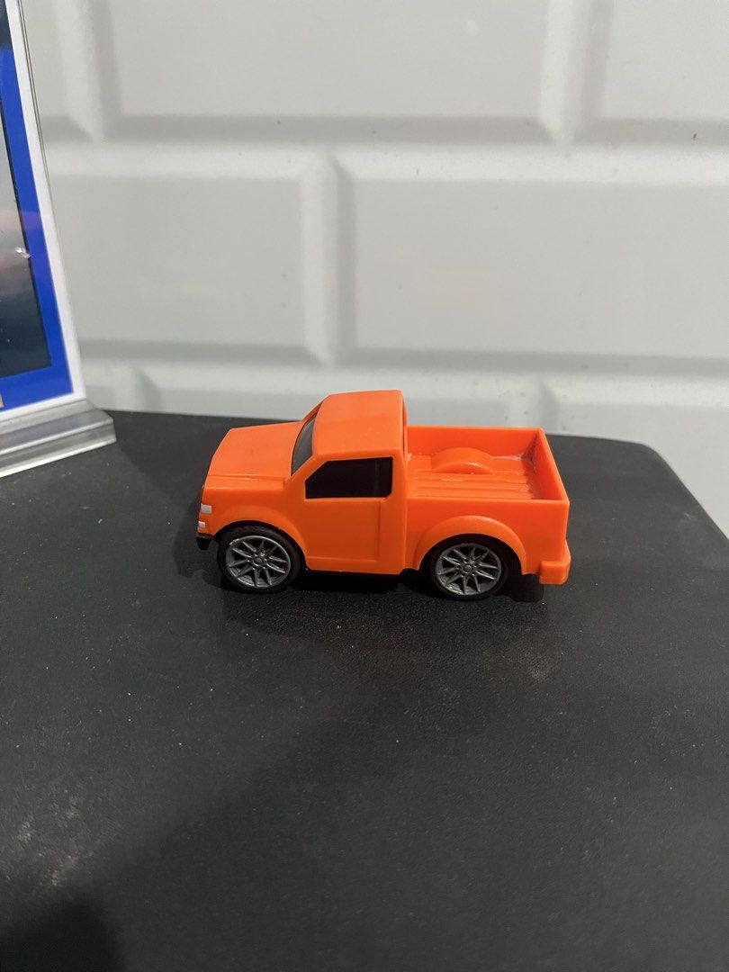 Toy Orange Pickup Car (Category: Kids Toys) located in Manila. Submitted by jyryl (Listing ID 1468173471, Image 2). Description: Orange Pick Up Toy Car.