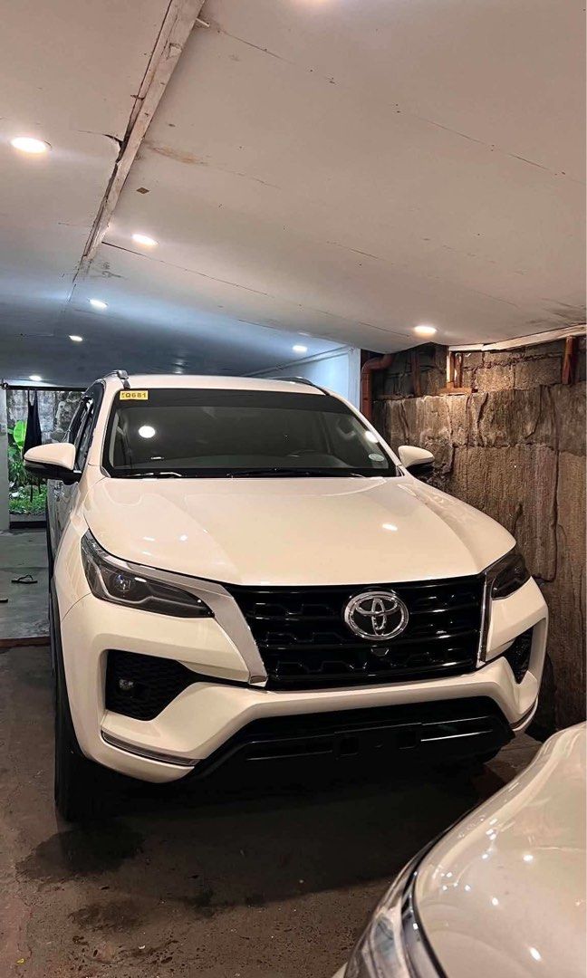 Toyota Fortuner V Auto (Category: Used Cars) located in Manila. Submitted by quality_cars (Listing ID 1468251241, Image 2). Description: 2021 Toyota Fortuner V | Push Start | 360° Camera & Daytime Running Light ✨ * Pearl White * Newly Ceramic Coated — Full Body & Windows * Only 38,000 KM * Last Casa Service at Toyota — 29,000 KM * All Original Paint * Complete with 2 Remote Keys * Complete Owner’s Manual/Booklet * Zero Issues — Well Maintained * 