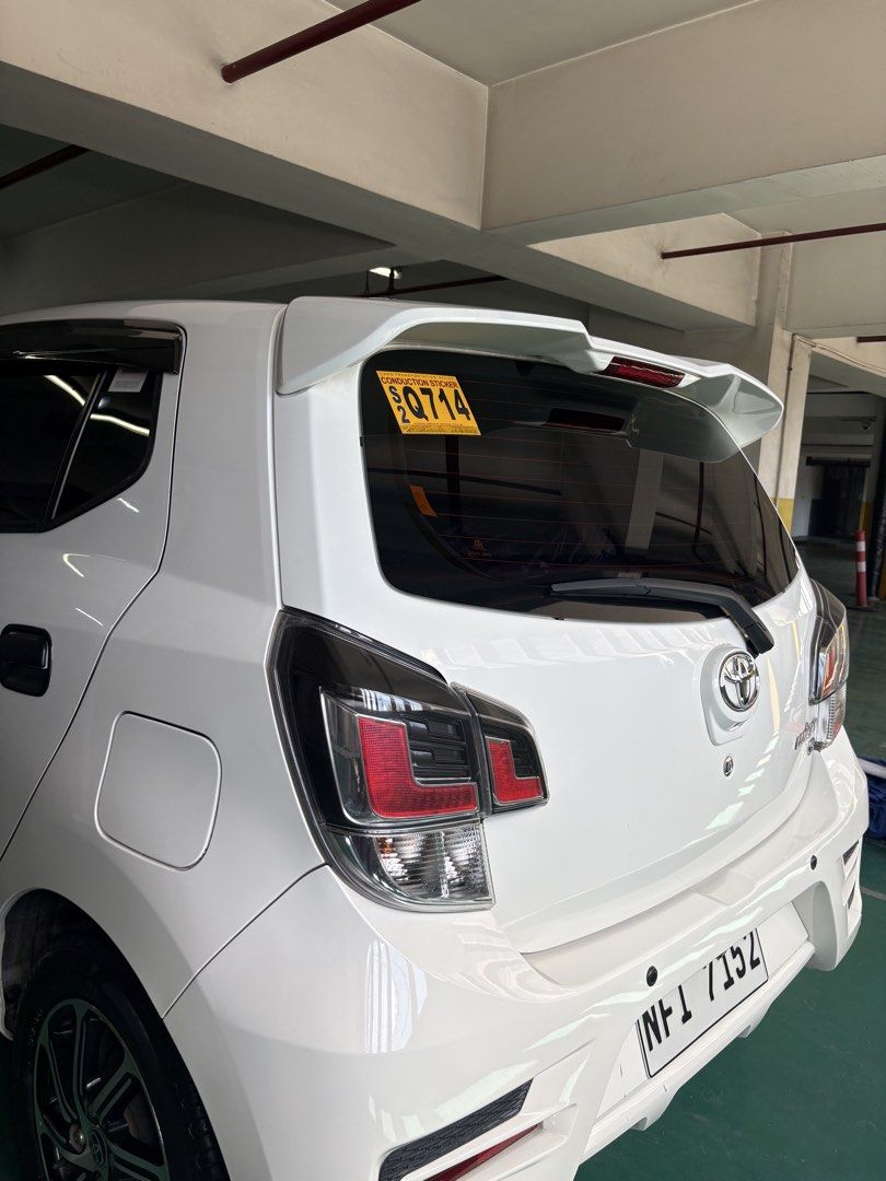 Toyota Wigo (Category: Used Cars) located in Manila. Submitted by jenashara (Listing ID 1468108033, Image 1). Description: Toyota Wigo G 2021 (AT) (Dec 2021 Acquired) Push start Auto folding side mirror Auto AC (digital) Very Low Mileage: 41K Daily driven Lady owned Fresh in and out Back seat still w/ plastic fr casa Keyless Entry (1 key only) Ice Cold Aircon Motolite Battery All LED headlights & foglights Bosch air horn Original spare tire inclu