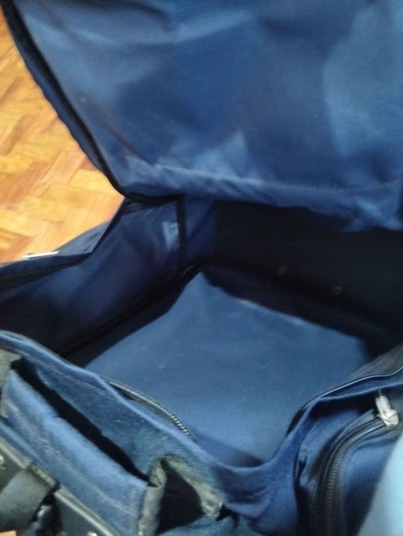 Trolley backpack wheeled by Olympia (Category: Travel Essentials & Accessories) located in Manila. Submitted by bethistama04142 (Listing ID 1468117935, Image 2). Description: - Brand: Olympia Sports Plus - Color: Blue - Condition: Good, well-maintained - Features: Retractable handle with smooth-rolling wheels - Versatility: Convertible design with hidden backpack straps - Storage: Spacious main compartment and multiple zippered outer pockets.