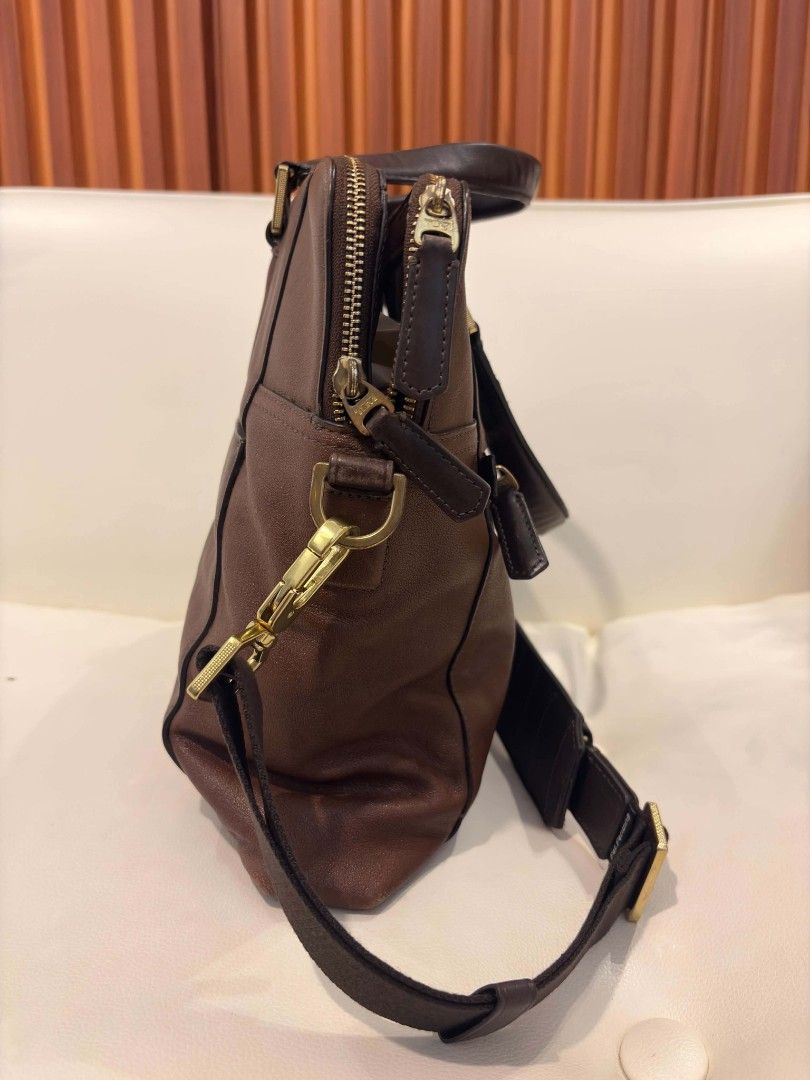 Tumi Dark Brown Leather Slim laptop Briefcase (Category: Luxury Bags & Wallets) located in Manila. Submitted by jzjapansurplus (Listing ID 1468099127, Image 3). Description: IMPORTED FROM JAPAN ORIGINAL TUMI BRAND DARK BROWN LEATHER SLIM BRIEFCASE 🎯 FRONT AND BACK POCKET COMPARTMENT 🎯 TOP HANDLE CARRY 🎯 ELEGANT STYLE SLIM FILE BAG 🎯QUALITY LEATHER MATERIAL 🎯WIDE SPACE CAPACITY 🎯 WITH SHOULDER STRAP 🎯 GUARANTEED AUTHENTIC NO ISSUE..IN VERY 