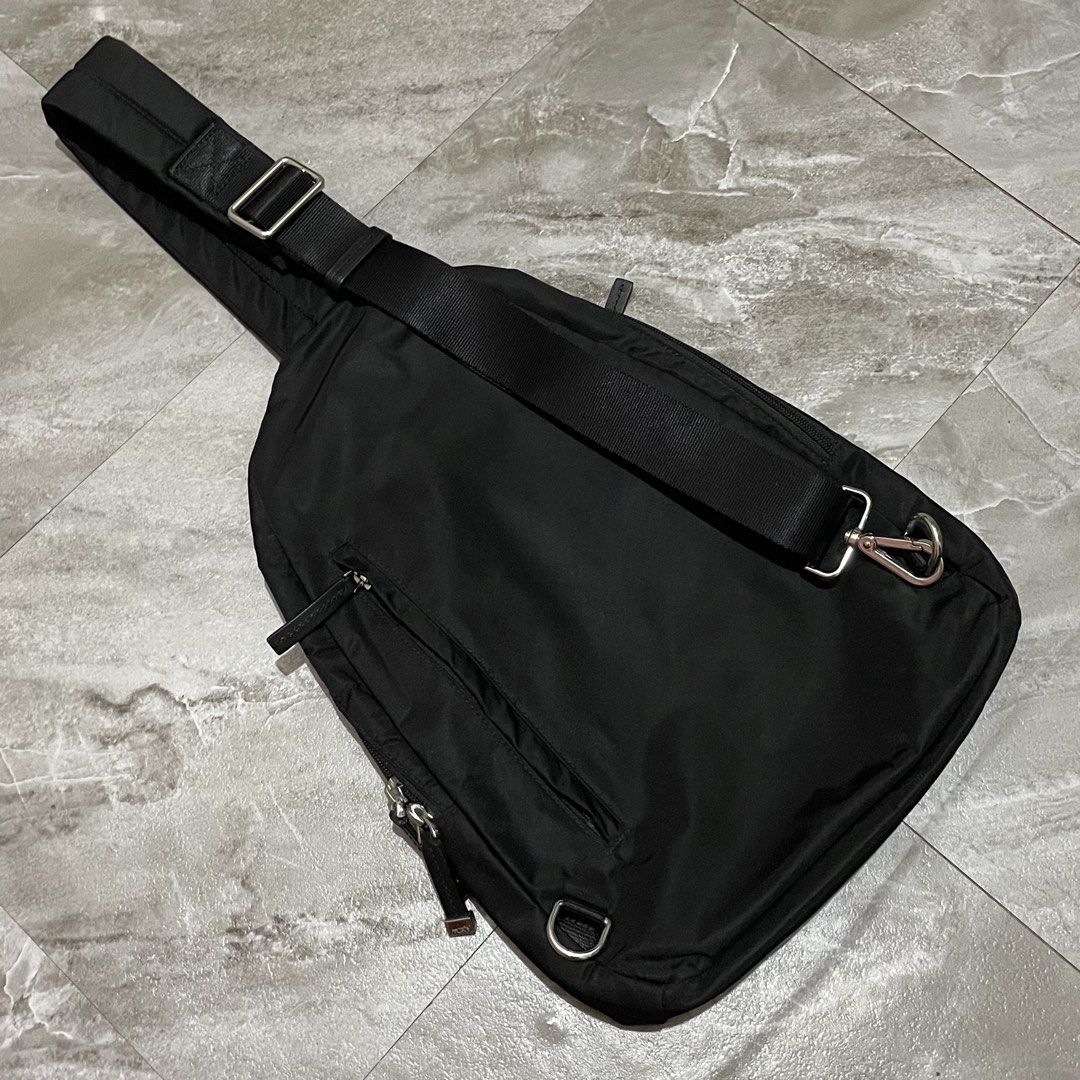 Tumi Voyageur Brive Nylon Sling Bag (Category: Backpacks) located in Manila. Submitted by astral_ (Listing ID 1468190793, Image 2). Description: Tumi Voyageur Brive Nylon Sling Bag Size: Medium Condition: 9/10 Issue: minor scuff mark Dimes Width: 10 in Height: 14.5 in Depth: 2 in Price: 3,500 shipped.