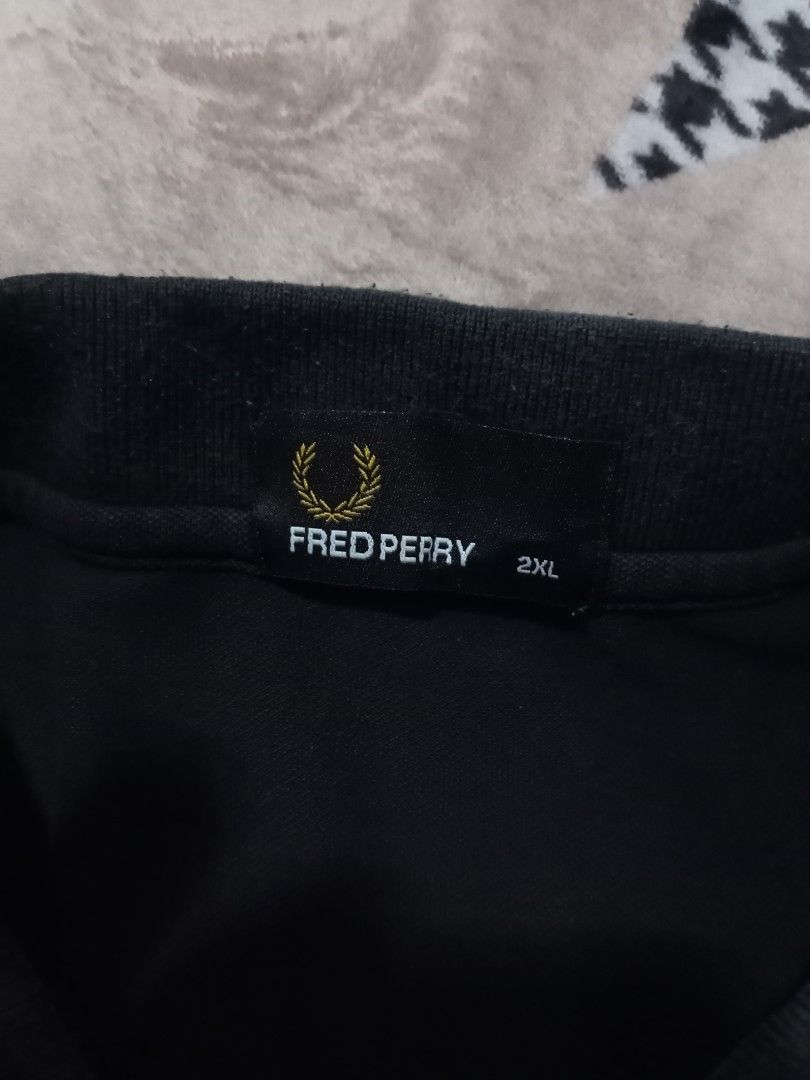 twintip Fred Perry polo shirt (Category: Tshirts & Polo Shirts ) located in Alburquerque. Submitted by ayrelieonlineshop (Listing ID 1468061432, Image 3). Description: Fred Perry twintip polo size 2XL dimensions W-22 L-28 excellent condition no pinhole or punit 9.5/10 color rate.