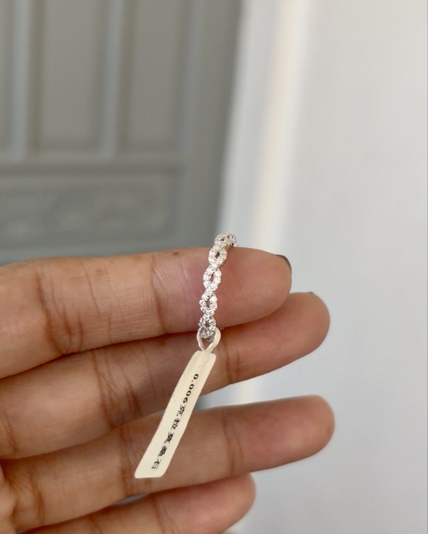 Twist Moissanite eterntiy ring (Category: Rings) located in Rizal. Submitted by katmandulovesmakeup (Listing ID 1468135903, Image 2). Description: Bnew twist moissanite eternity ring Size 6 S925 silver setting .
