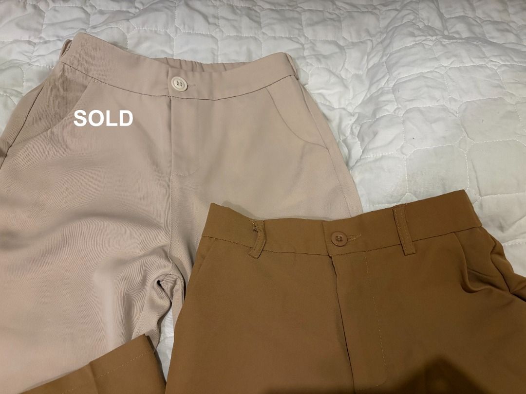 High-waisted office trousers brown (Category: Jeans) located in Antipolo. Submitted by renz_1 (Listing ID 1464923543, Image 3). Description: - Classic straight leg fit with structured fabric - Functional features: front button closure, belt loops, and side pockets - Versatile everyday basics, great for office wear or casual outfits - Condition: Excellent (ready to wear!) SMALL size (25-26).