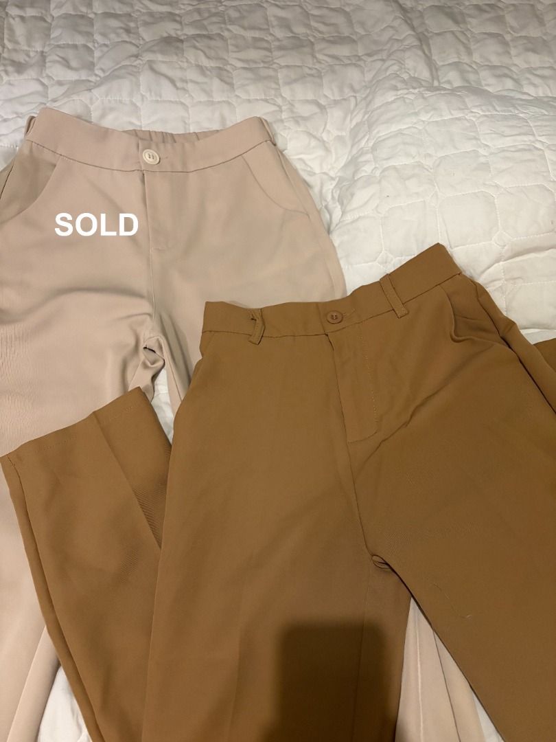 High-waisted office trousers brown (Category: Jeans) located in Antipolo. Submitted by renz_1 (Listing ID 1464923543, Image 2). Description: - Classic straight leg fit with structured fabric - Functional features: front button closure, belt loops, and side pockets - Versatile everyday basics, great for office wear or casual outfits - Condition: Excellent (ready to wear!) SMALL size (25-26).